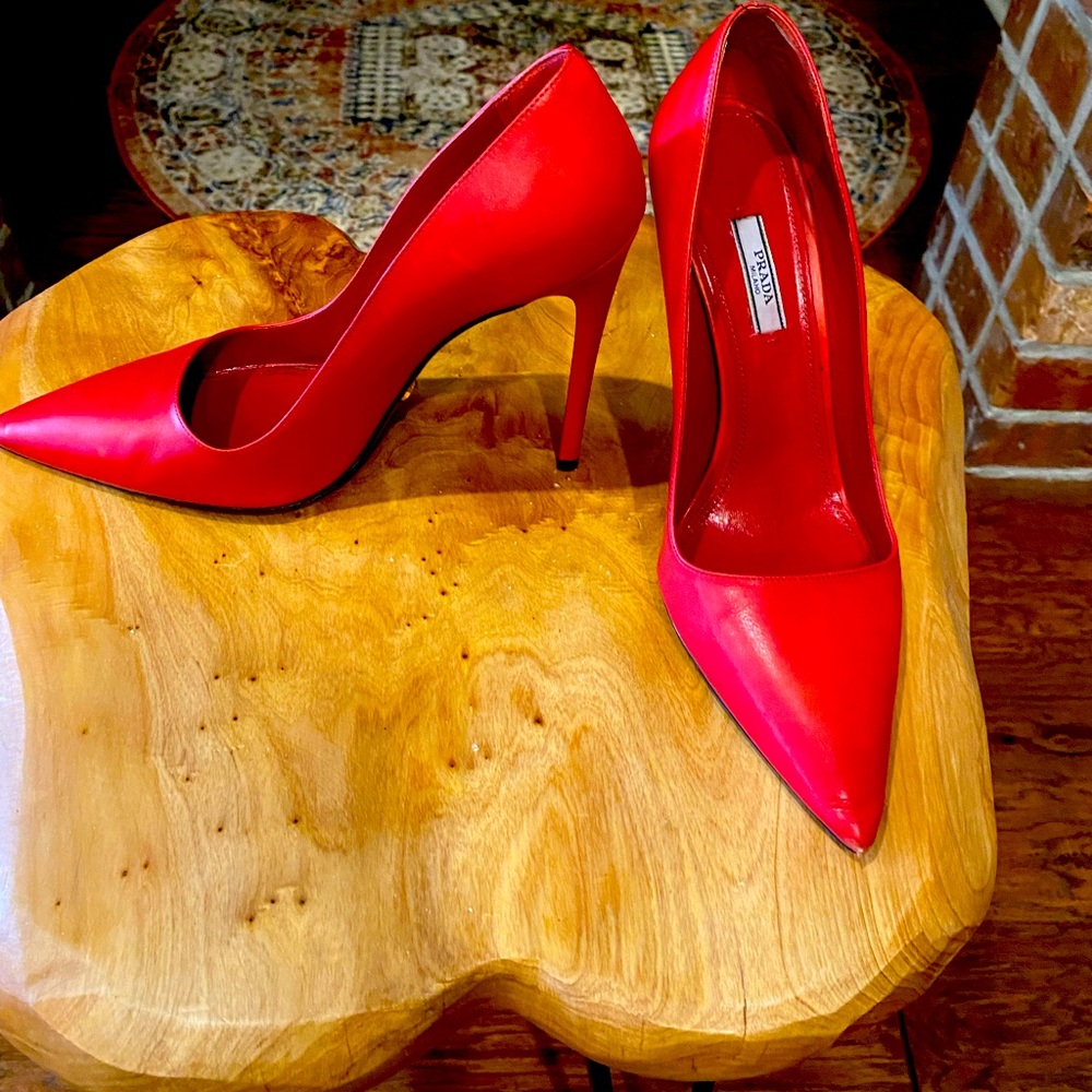 Beautiful,classic Prada pumps. Lipstick red.